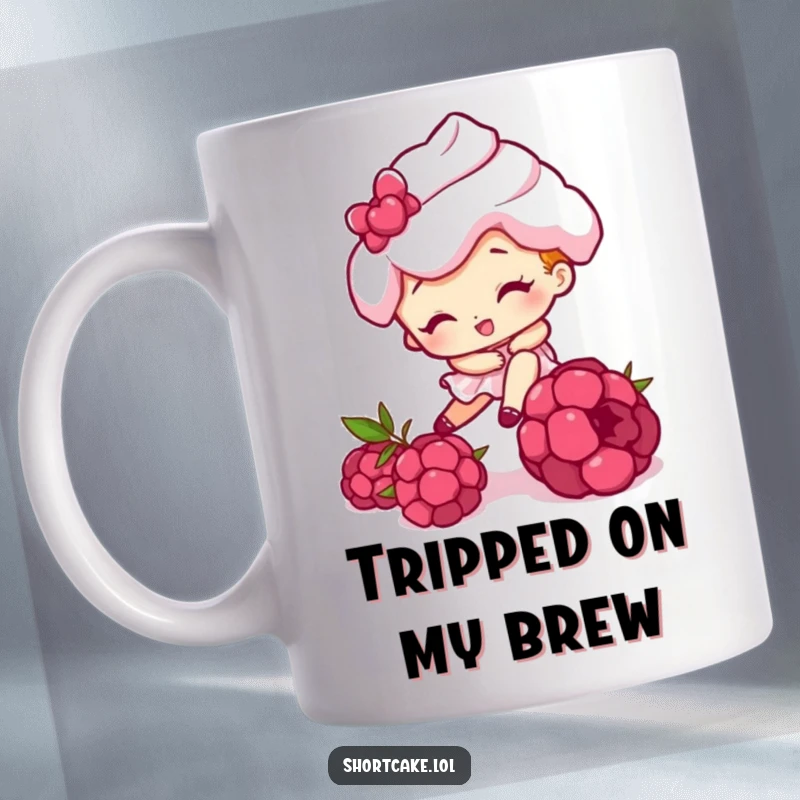 Funny mug depicting a shortcake character comically tripping over a small raspberry, illustrating a moment of sweet, clumsy humor.