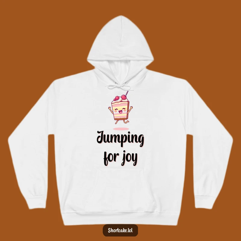 Funny Shortcake Slice Hoodie: Joyful Leap Character, Cozy Hilarious Gift for Sweet Souls