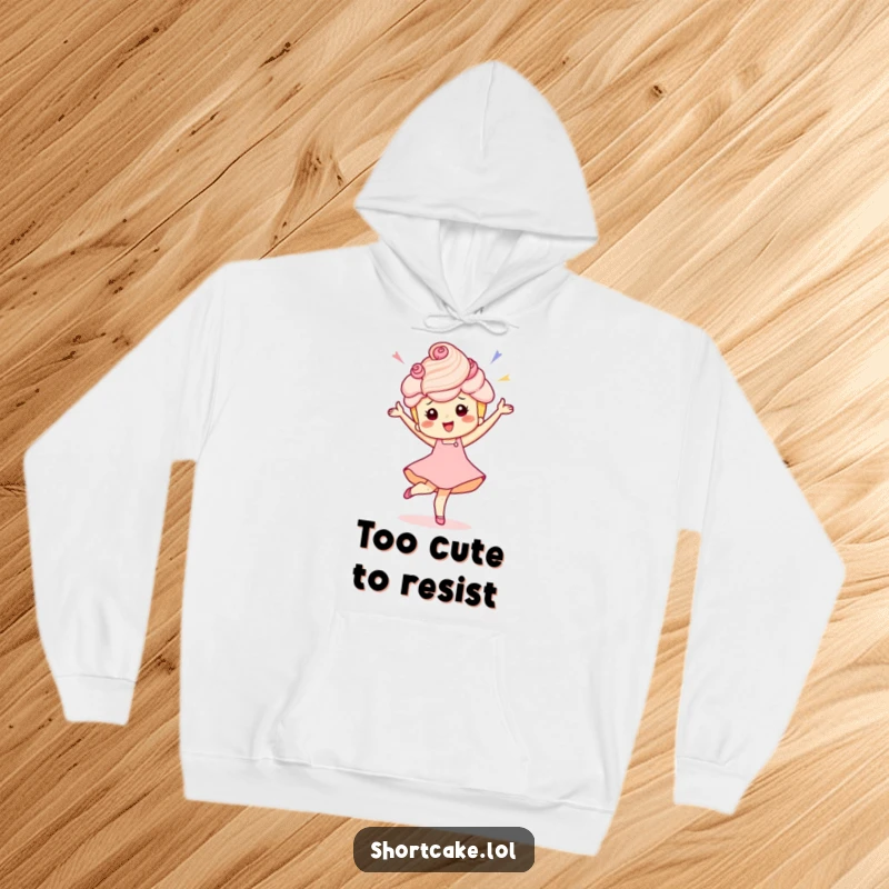 Funny hoodie showcasing a shortcake character in a dynamic, celebratory pirouette pose, perfect for cozy laughs.