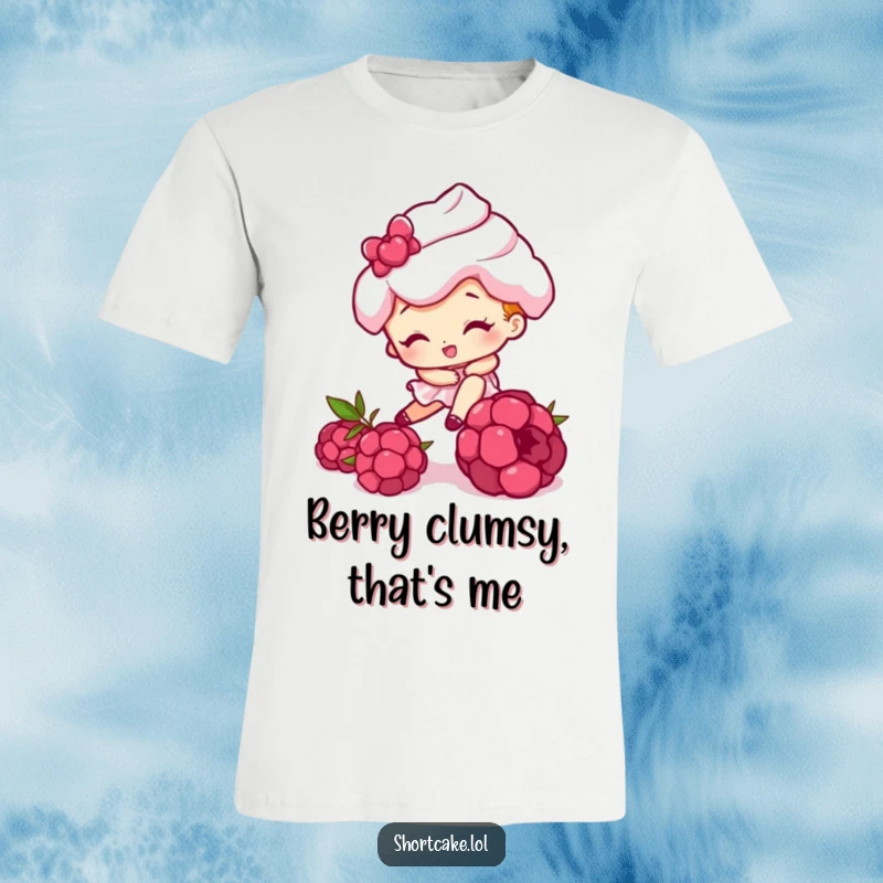 Funny t-shirt showing a shortcake character comically tripping over a raspberry, perfect for those who enjoy a bit of visual humor.